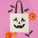 Girly Jack O Lantern Pumpkin Face Halloween Tote Bag<br><div class="desc">Celebrate Halloween in style with this girly pumpkin face tote bag. This fun jack o lantern design has a bright toothy grin and fabulous eyelashes!</div>