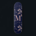 Girly Navy Blue Marble Rose Gold Foil Monogram Skateboard<br><div class="desc">Girly Navy Blue Marble Rose Gold Foil Monogram Skateboard with trendy coppery rose gold/pink on navy blue marble and your custom monogram. Perfect for your girly,  luxury aesthetic.</div>