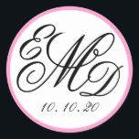 Girly Pink, Black Three Initials Monogram Wedding Classic Round Sticker<br><div class="desc">Simple, elegant script font in black and white three letter monogram logo with wedding date on a girly pink background colour. Use these stylish stickers as save the date stickers, wedding favour labels or as envelope seals as an added touch. Contact luxuryweddinginvitations@gmail.com for other initials, colours or help designing your...</div>