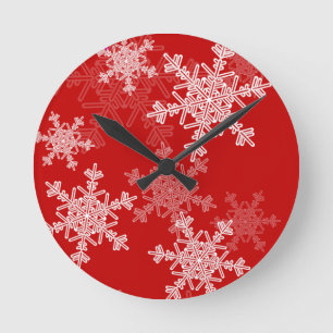Girly red and white Christmas snowflakes Round Clock