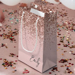 Girly Rose Gold Blush Pink Glitter Monogram Small Gift Bag<br><div class="desc">Girly Rose Gold - Blush Pink Glitter Script Monogram Name Gift Bag. This makes the perfect sweet 16 birthday,  wedding,  bridal shower,  anniversary,  baby shower or bachelorette party gift bag for someone that loves glam luxury and chic styles.</div>