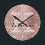 Girly Rose Gold Glitter Sparkle Glam Monogram Name Round Clock<br><div class="desc">This trendy and unique glam girly design features a large customisable monogram in pale rose gold in the centre in popular serif typography along with a customisable name in popular script with a hand-lettered look in dark grey. The background includes brushed rose gold metal and glimmering diamonds for added glitter...</div>