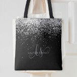 Glam Black Silver Glitter Monogram Name Tote Bag<br><div class="desc">Glam Black Silver Glitter Elegant Monogram Tote Bag. Easily personalise this trendy chic tote bag design featuring elegant silver sparkling glitter on a black background. The design features your handwritten script monogram with pretty swirls and your name.</div>