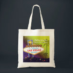 Glam Las Vegas Wedding Maid of Honour Gift Tote Bag<br><div class="desc">Big and glamourous Las Vegas strip sign tall palm trees and colourful stars yellow & purple shades background illustrated on custom Maid of Honour Gift Bags. Personalise the artsy and unique tote bags for your maid of honour and/or bridesmaids to thank them! ((You can find the matching wedding essentials &...</div>