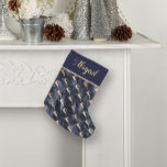 Glam Navy Blue Gold Reindeer Pattern Personalised Small Christmas Stocking<br><div class="desc">With its pattern of gold reindeer silhouettes leaping on a navy blue faux foil background, this Christmas stocking will make an elegant addition to your holiday decor. Personalise it with a name or other text in gold-coloured calligraphy on a solid navy blue colour block with a gold-coloured edge. The design...</div>