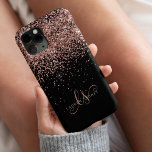 Glam Rose Gold Glitter Elegant Monogram iPhone 14 Plus Case<br><div class="desc">Glam Rose Gold Glitter Elegant Monogram iPhone Case. Easily personalize this trendy chic phone case design featuring elegant rose gold sparkling glitter on a black background. The design features your handwritten script monogram with pretty swirls and name.</div>