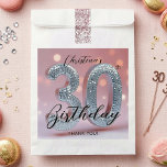 Glam Silver Disco Ball Pink 30th Birthday Favour Bags<br><div class="desc">Celebrate your milestone in unforgettable style with this glamorous 30th birthday favor bag! The artwork features a stunning 3D silver disco ball mosaic forming the number "30", which immediately sets a fun and festive mood. This brilliant silver centerpiece pops beautifully against a dreamy, soft pink background illuminated by glowing bokeh...</div>