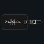 Glamourous black white monogram travel luggage tag<br><div class="desc">Personalised monogram black and white travel luggage tag. Classy glamourous monogrammed design with white script typography name and intitial. Elegant gift idea for men and women. Customisable colours. Sophisticated gift for dad,  mum,  mother,  father,  wife,  sister,  uncle,  husband,  brother,  grandpa etc. Luxury accessories for luxurious bags and suitcases.</div>