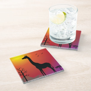 Glass coaster with giraffe in sunset theme.