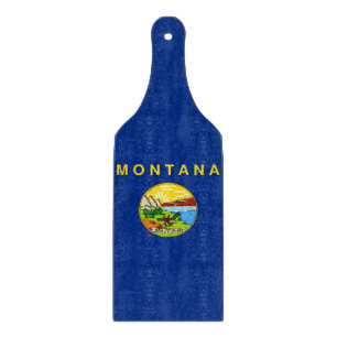 Glass cutting board paddle with Montana flag