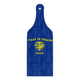 Glass cutting board paddle with Oregon flag