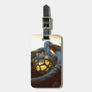 Glass float glows at sunset, Alaska Luggage Tag