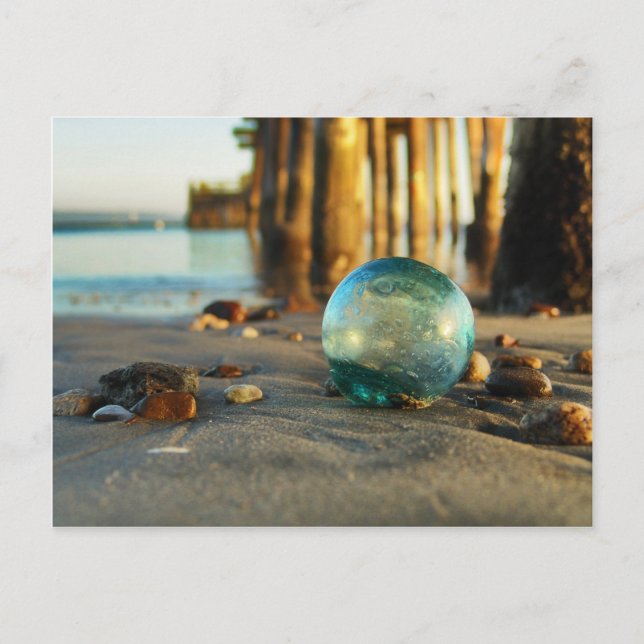 Glass float in front of pier postcard (Front)
