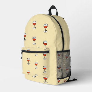 Glass of wine on orange printed backpack