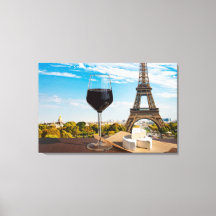 Glass of wine with brie cheese on Eiffel tower