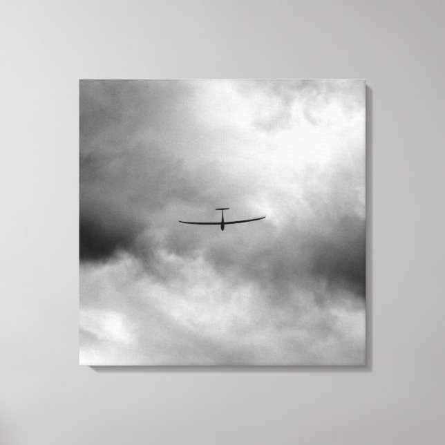 Glider flying in gray sky canvas print (Front)