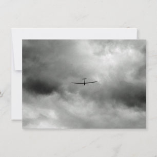 Glider flying in grey sky card
