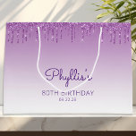 Glitter Drip 80th Birthday Purple Large Gift Bag<br><div class="desc">This chic 80th birthday party gift bag features a sparkly purple faux glitter drip border and purple ombre background. Personalise it with her name in handwriting script,  along with her birthday and date below.</div>