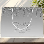 Glitter Drip 90th Birthday Silver Large Gift Bag<br><div class="desc">This chic 90th birthday party gift bag features a sparkly silver faux glitter drip border and ombre background. Personalise it with her name in handwriting script,  along with her birthday and date below.</div>
