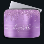 Glitter Purple Drips Monogrammed Laptop Sleeve<br><div class="desc">Monogrammed chic and girly laptop sleeve featuring purple faux glitter drips on a purple faux brushed metallic background. Personalise with your name in a stylish trendy white script with swashes.</div>
