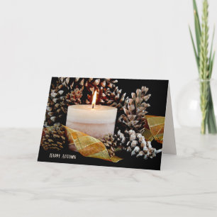 glowing candle in pine cones card