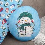 Glowing Lights Winter Wonders Snowman Christmas Round Cushion<br><div class="desc">Elevate your holiday decor with our enchanting "Glowing Winter Wonders" Round Throw Pillow. This delightful pillow is a captivating addition to your festive ambiance, boasting a playful design that encapsulates the enchanting spirit of the Christmas season. The front of the pillow features an endearing snowman tangled in glowing lights, radiating...</div>