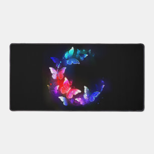 Glowing Neon Night Butterflies on Black background Desk Mat