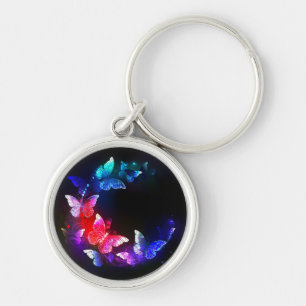 Glowing Neon Night Butterflies on Black background Key Ring