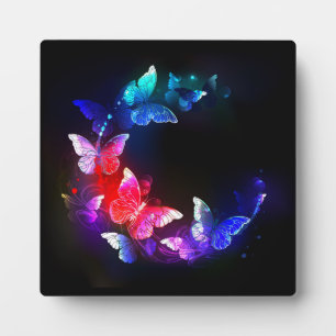 Glowing Neon Night Butterflies on Black background Plaque