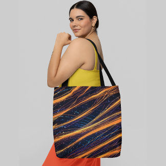 Glowing orange and blue abstract lines with sparks tote bag