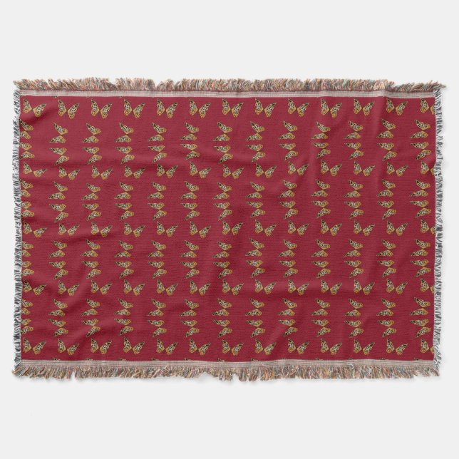 Gold and black butterflies on maroon throw blanket (Front)