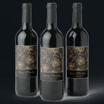 Gold and Black Christmas Floral Wine Label<br><div class="desc">Gold poinsettias,  holly leaves and berries on a black background,  these wine bottle labels feature your greeting and name in chic gold lettering. MATCHING items in our collection.</div>