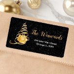 Gold and Black Christmas Gift Label<br><div class="desc">This elegant and chic address label features a gold ribbon Christmas tree with a present. The text combines handwritten script and modern sans serif fonts for a classy and sophisticated look. The falling snow, snowflakes and sparkles give a festive and magical touch. This is perfect for Christmas and the holiday...</div>