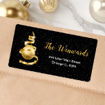 Gold and Black Christmas Ornament Label<br><div class="desc">This elegant and chic address label features a gold ribbon Christmas tree with a bauble ornament. The text combines handwritten script and modern sans serif fonts for a classy and sophisticated look. The falling snow, snowflakes and sparkles give a festive and magical touch. This is perfect for Christmas and the...</div>
