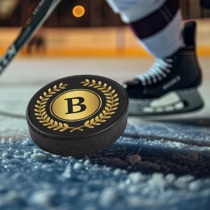 Gold and Black Monogram with Laurel Wreath Hockey Puck