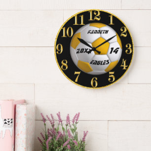 Gold and black soccer clock with Player Name