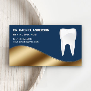 Gold and Navy Blue Tooth Dental Clinic Dentist Business Card