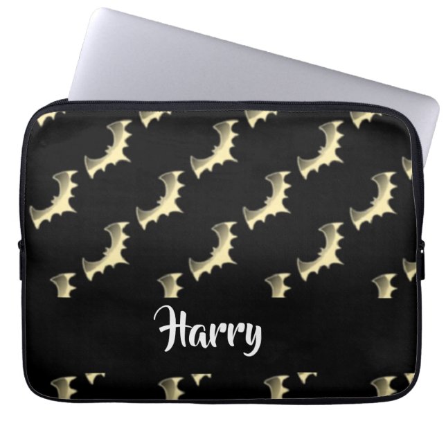 Gold bats on black laptop sleeve (Front)