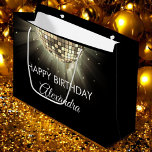 Gold Black 60th Birthday Party 70's Disco Ball Large Gift Bag<br><div class="desc">Add a groovy touch to your birthday gift with our Gold 60th Birthday Party 70's Disco Ball Large Gift Bag. This vibrant and retro-inspired bag is the perfect choice to present your special gift in style, adding an extra layer of excitement to the celebration. In a lively shade of purple,...</div>