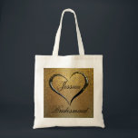 Gold Black Confetti Heart Wedding Welcome Tote Bag<br><div class="desc">Gorgeous luxe wedding welcome bag for a bridesmaid. It all starts with a deep gold background that glows from the centre. A bold swirl of a romantic heart frames her name and the word bridesmaid is written below. A fancy font in black adds to the formal drama. Gold confetti is...</div>