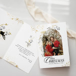 Gold & Black Floral Boho Arch Photo Christmas Card<br><div class="desc">A Black and Gold Magic Forest Custom Photo Christmas Holiday Card is a festive and enchanting way to extend warm wishes to your friends and family during the holiday season. The card features a stunning combination of black and gold, creating an elegant and magical atmosphere reminiscent of a winter wonderland....</div>