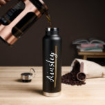 Gold Brush stroke Handlettering Name Script Custom Water Bottle<br><div class="desc">Add a touch of elegance and personalisation to your hydration routine with this Gold Brush Stroke Handlettering Name Script Custom Water Bottle. Designed to be customised, this water bottle features a printed gold brush stroke that beautifully underlines the name of your choice. Make a statement with this sleek black water...</div>