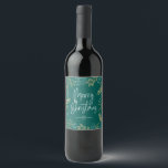 Gold Christmas Greenery on Teal Wine Label<br><div class="desc">This wine bottle label features a beautiful border of gold greenery on a dark teal background. The message "Merry Christmas" is a trendy handwritten style text. Personalise this holiday label with your name.</div>