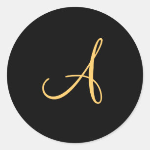 Gold-coloured initial A on black monogram sticker