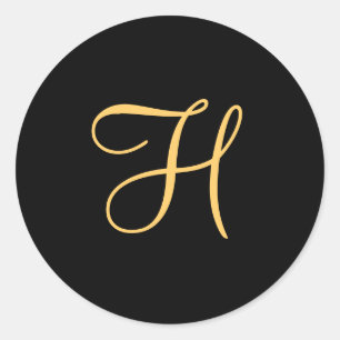 Gold-coloured initial H on black monogram  round C Classic Round Sticker