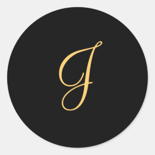 Gold-coloured initial J on black monogram sticker