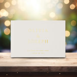Gold Foil Wedding Custom Ivory Guest Book<br><div class="desc">Modern elegant gold foil wedding guest book. Simply customise names and date in gold foil lettering which is on a Ivory background.</div>