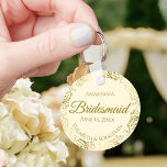 Gold Frills on Cream Bridesmaid Wedding Gift Key Ring<br><div class="desc">These keychains are designed to give as favours to bridesmaids in your wedding party. They feature a simple yet elegant design with an ivoryor cream coloured background, gold script lettering, and a lacy golden faux foil floral border. The text says "Bridesmaid" with space for her name, the names of the...</div>