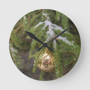 Gold Glass Christmas Ornament On Evergreen Tree Round Clock