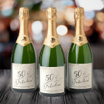 Gold Glitter 50th Birthday Party Sparkling Wine Label<br><div class="desc">Celebrate your fiftieth birthday in style with these custom wine labels. "50 & Fabulous" is written in an elegant script against a gold background,  with gold faux glitter dripping from the top. Personalise with your name and party date.</div>